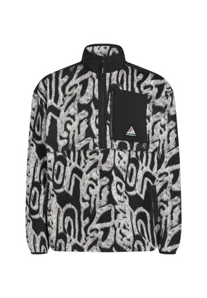 Black and white fleece pullover with abstract pattern, half-zip closure, and black chest pocket featuring a logo patch.