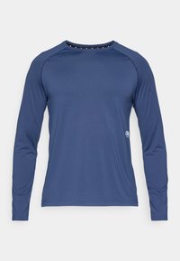 Long-sleeve shirt in navy blue, made from a smooth, stretchy material. Features raglan sleeves and a round neckline with decorative accents.