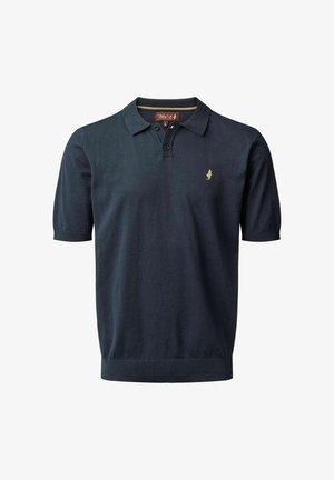 Tumesinine polo-särk, mis on valmistatud puuvillasegust, klassikalise krae, lühikeste varrukate ja vasakul rinnal väikese kuldse logoga.