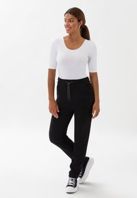 Les Lunes FRAYAA - Træningsbukser - schwarz