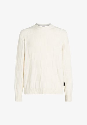 Kremasti pleteni pulover s izrezbarenim kvadratnim uzorkom, okruglim izrezom i rebrastim rukavima. Oznaka sa strane.