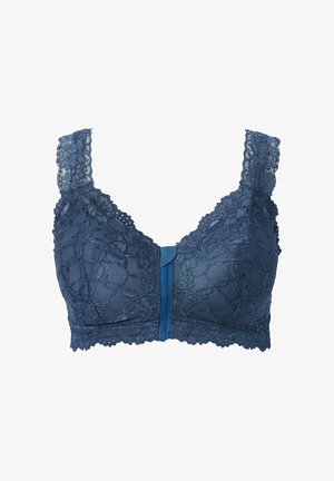 Lace bra in dark blue with floral pattern, wide lace straps, front closure, and textured fabric at the base.