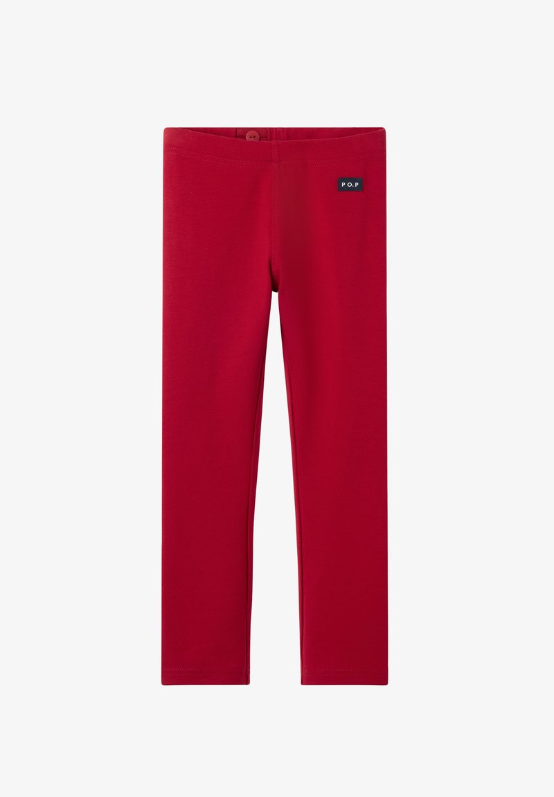 Rode legging gemaakt van zacht, rekbaar materiaal met een aansluitend ontwerp. Heeft een klein merketiket op de tailleband. Geen zichtbare patronen of accenten.