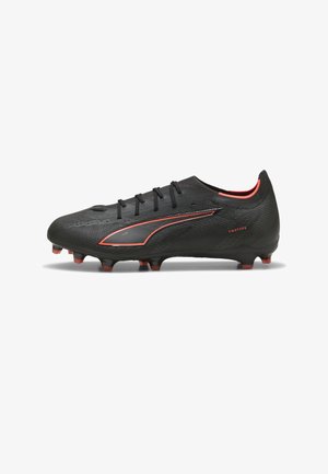 Black and red lightweight soccer cleat with textured surface, laces, and molded studs designed for firm ground play.