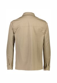 Light beige long-sleeve shirt, back view. Features a classic collar, buttoned cuffs, and a smooth fabric texture. Tailored design.