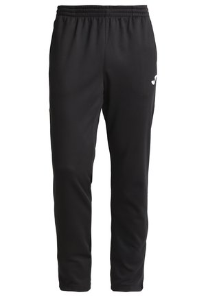 Pantalones deportivos negros hechos de una tela suave y elástica. Cuentan con una cinturilla elástica y un pequeño logo blanco en la cadera izquierda.