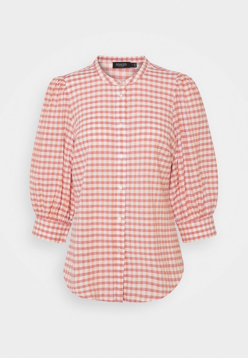 Blouse à carreaux rose et blanche avec manches trois-quarts bouffantes, boutonnée devant et col rond.