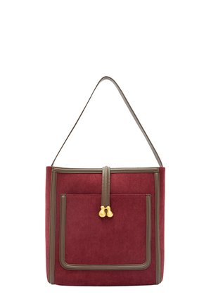Borsa tote in velluto a coste rossa con bordatura beige, caratterizzata da una tasca frontale e un dettaglio con chiusura dorata. Le spalline piatte completano il design.