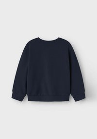 Felpa in cotone blu navy con scollo rotondo, maniche lunghe e polsini e orlo a costine. Tessuto liscio, design essenziale.