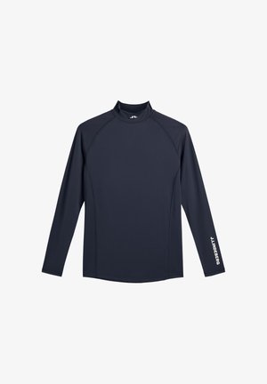 Chemise de sport à manches longues, bleu marine foncé, col montant, avec le texte blanc "J.LINBERG" sur la manche droite, sur fond blanc.