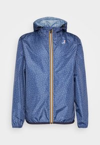 Blå mønstret jakke med hætte, elastiske manchetter og kant. Har en lodret lynlås i gul og rød. Producentens logo på brystet.