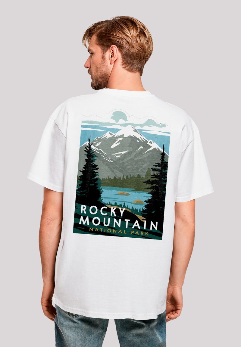 White T-shirt featuring a back design of Rocky Mountain National Park, showcasing mountains, trees, and a lake in vibrant colors.