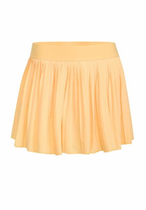 Minigonna plissettata color pesca con una larga fascia in vita e una silhouette svasata.