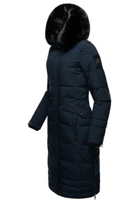 Navy puffer coat featuring a faux fur hood, quilted texture, front pockets, and a zipper closure. Accented with a decorative logo patch.