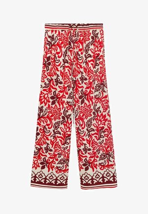 Floral-patterned pants in red, maroon, and white. Loose fit with an elastic waistband and drawstring, featuring intricate designs.