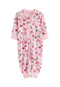 Pink fleece onesie with long sleeves, featuring a playful print of bows, holly, and ornaments. Zipper closure runs down the front.