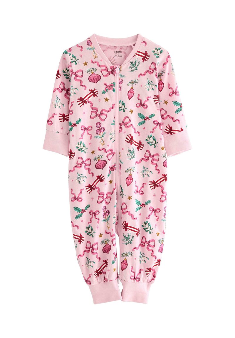 Pink fleece onesie with long sleeves, featuring a playful print of bows, holly, and ornaments. Zipper closure runs down the front.