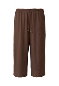 Lichte bruine shorts met een elastische tailleband en een verstelbaar trekkoord. De geweven textuur creëert een subtiel patroon door het geheel.