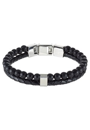 Bracciale in pelle intrecciata nera con perline nere rotonde e un chiusura in argento. Caratterizzato da un design testurizzato con accenti lisci.
