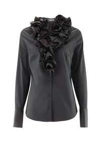 Black long-sleeve blouse with a ruffled collar, made of smooth fabric. Features button closure and a single pocket on the left side.