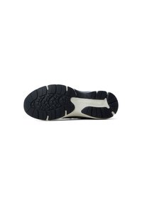 Suela de zapatilla deportiva negra con agarre texturizado, que presenta una entresuela blanca y patrones de banda de rodadura definidos para tracción.