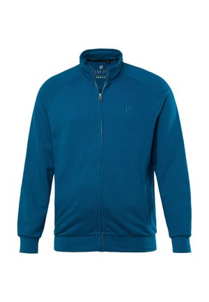 Chaqueta de cremallera en azul verdoso, hecha de una tela suave. Presenta un cuello alto, mangas raglán y bolsillos laterales. Logotipo sutil en el pecho.