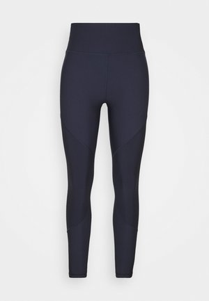 Mørkeblå leggings med høy midje, med teksturerte sidestykker og glatt stoff for fleksibilitet og komfort.