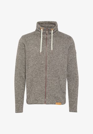 Grå hettejakke med glidelås og høy krage, med kontrasterende kremfargede snorer, to frontlommer og en læretikett i kanten.