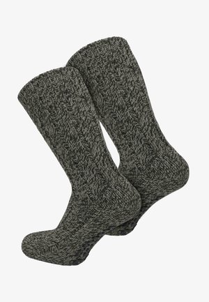 Graue gestrickte Socken mit einem strukturierten Rippenmuster, verstärkter Spitze und Ferse sowie einem groben Strickmuster.