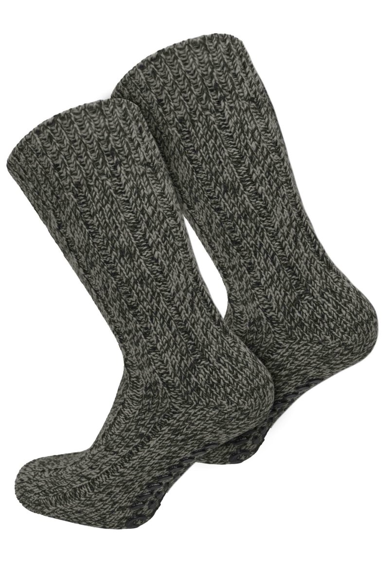 Graue gestrickte Socken mit einem strukturierten Rippenmuster, verstärkter Spitze und Ferse sowie einem groben Strickmuster.