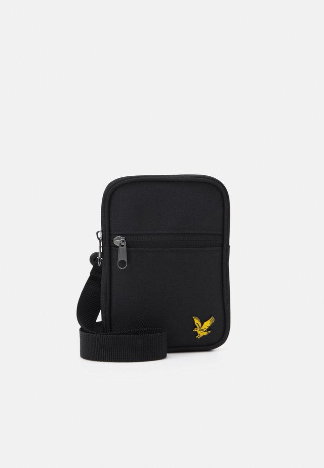 SMALL MESSENGER UNISEX - Axelremsväska - true black