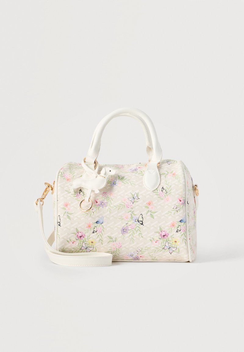 Sac à main blanc avec motifs floraux et papillons, poignées supérieures, bandoulière amovible et un petit pendentif en forme de chien.