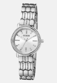 Silberner Edelstahl-Uhren mit einem strukturierten weißen Zifferblatt, kristallenen Akzenten auf der Lünette und den Stundenmarkierungen sowie einem Gliederarmband-Design.