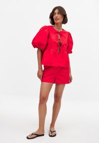 Pusero - red