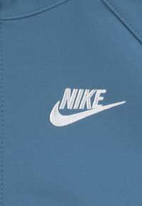 Nike Sportswear FUTURA UNISEX - Soft shell striukė - aegean storm