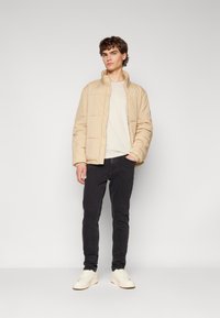 Tommy Jeans AUSTIN - Slim fit jeans - denim black