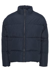 Navy puffer jacket made of quilted nylon, featuring a high collar and front zipper, with two side pockets and a loose, oversized shape.