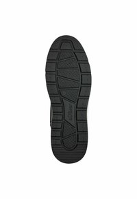 Semelle de chaussure en caoutchouc noire avec des motifs de texture pour améliorer l'adhérence, présentant des sections surélevées et des rainures pour la traction, étiquetée "s.Oliver" et taille 42.