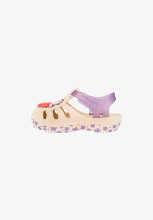 Sandalo chiuso per bambini con base crema, motivi di stelle viola sulla suola, cinturino viola al tallone e elemento decorativo rosso e bianco sul davanti.