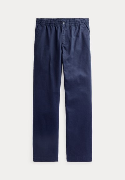 Mörkblå bomullsbyxor med elastisk midja, knappstängning, två sidofickor och rak ben-design. Slät textur, minimal detaljering.