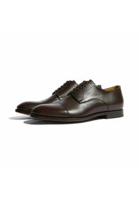 Scarpe eleganti in pelle marrone con finitura liscia, punta rotonda e design con lacci. Presentano cuciture sottili e un tacco basso impilato.
