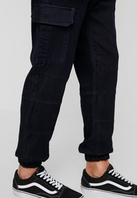 Urban Classics Kapsáče - blue denim