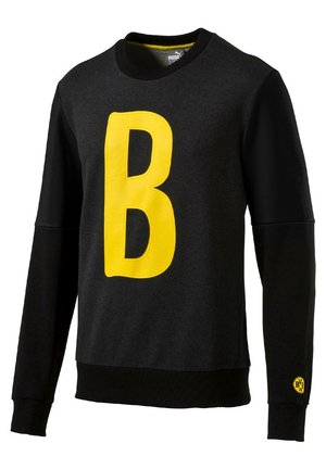 Zwarte crewneck sweatshirt met een grote gele "B" op de voorkant, textuurstof en geribde manchetten. Puma-logo op de hals.