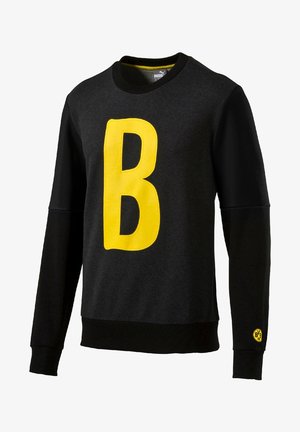 Felpa nera a collo rotondo con una grande "B" gialla sulla parte anteriore, in tessuto testurizzato e con polsini a costine. Logo Puma sul collo.