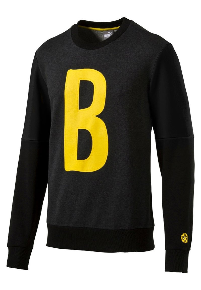 Felpa nera a collo rotondo con una grande "B" gialla sulla parte anteriore, in tessuto testurizzato e con polsini a costine. Logo Puma sul collo.