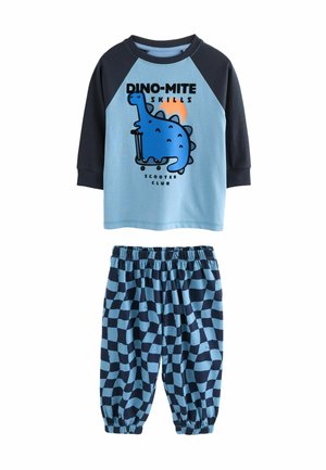 Zweiteiliges Kinder-Pyjama-Set. Oberteil mit blauen Raglanärmeln und Dinosaurier-Grafik sowie Text; marineblau karierte Hosen mit elastischem Bund. Aus weicher Baumwolle.