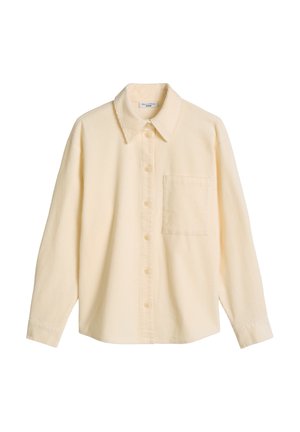 Chemise beige en velours côtelé à manches longues, avec col, boutons devant et une poche poitrine à gauche.