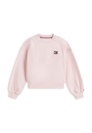Sweat-shirt à manches longues rose clair avec poignets et ourlet côtelés, col rond, et petit logo rectangulaire Tommy Hilfiger sur la poitrine.