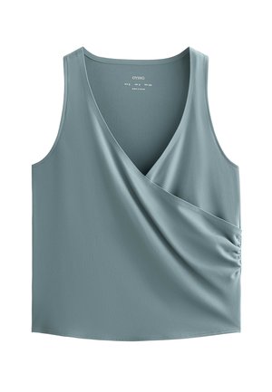 Svijetloplavi top bez rukava s V-izrezom, omotnim dizajnom i naboranim detaljem sa strane. Izrađen od glatke tkanine s blagim sjajem.