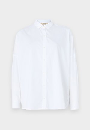 White long-sleeve button-up shirt with a classic collar, made from smooth fabric, featuring subtle side slits at the hem.